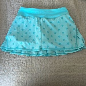 Lululemon tennis/golf skirt. Aquamarine/ polka dot print. Size 2.